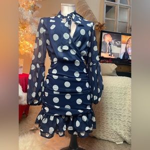 Blue Polka Dot Mini Dress, Bow Tie Plunging Neck, Ruched Open Back Ruffle Hem